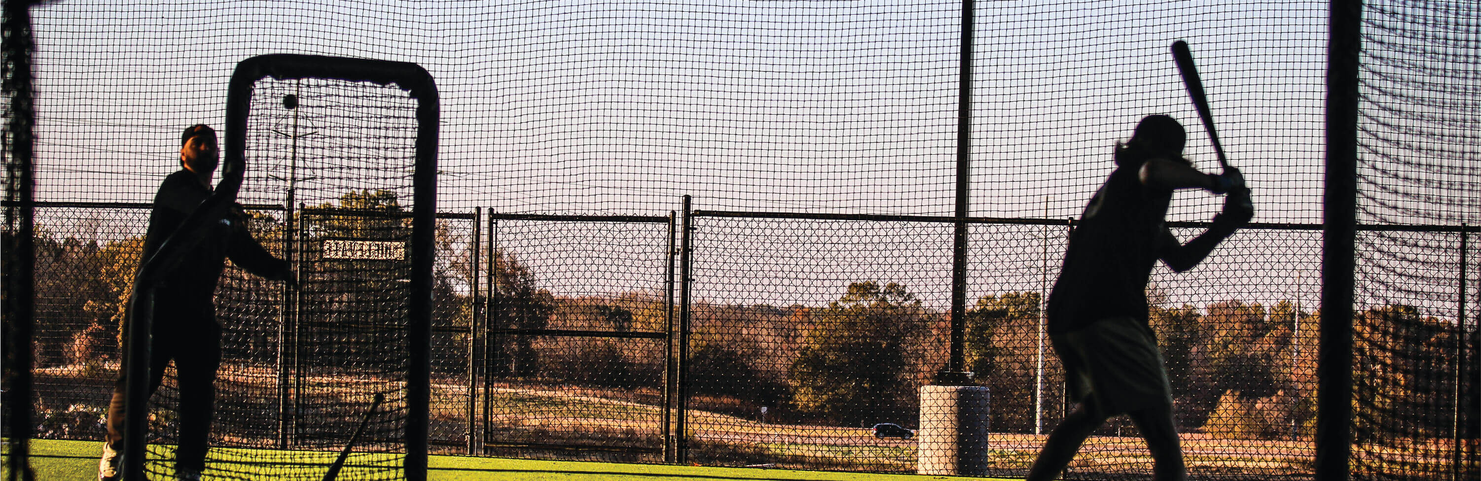 Indoor and outdoor baseball practice facility